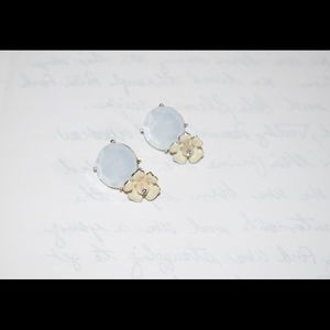 White and gold statement earrings